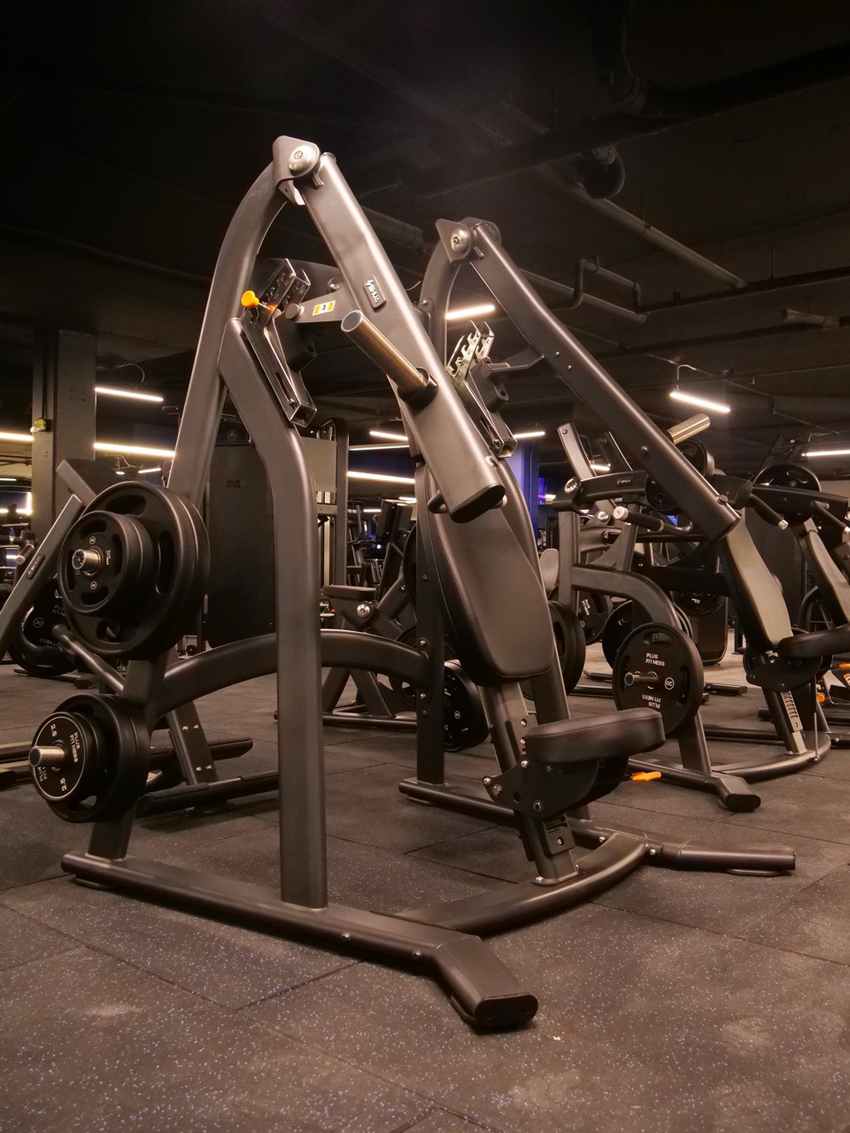 Plate-loaded incline press machines in a row
